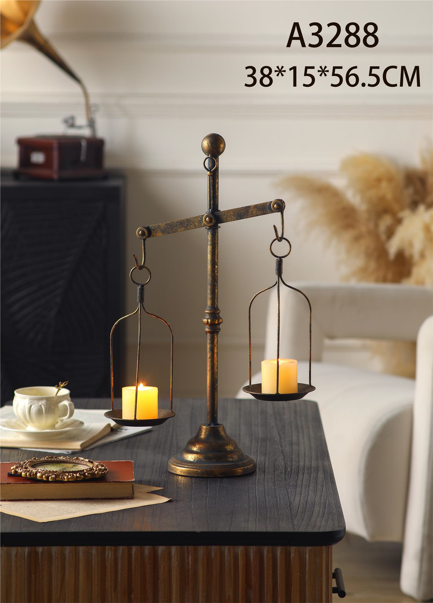 vintage iron candle holder with a balance scale design